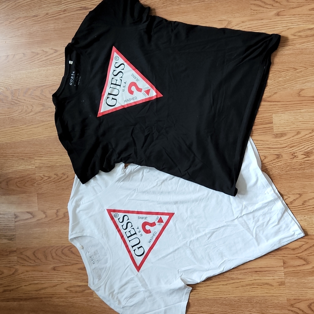 2 pre owned Guess tshirts size large